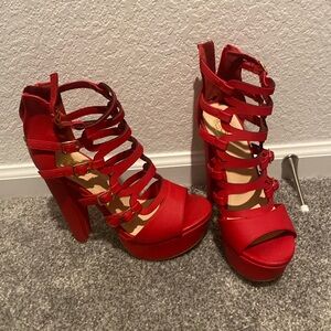 Speed limit 89 strappy red chunky heels